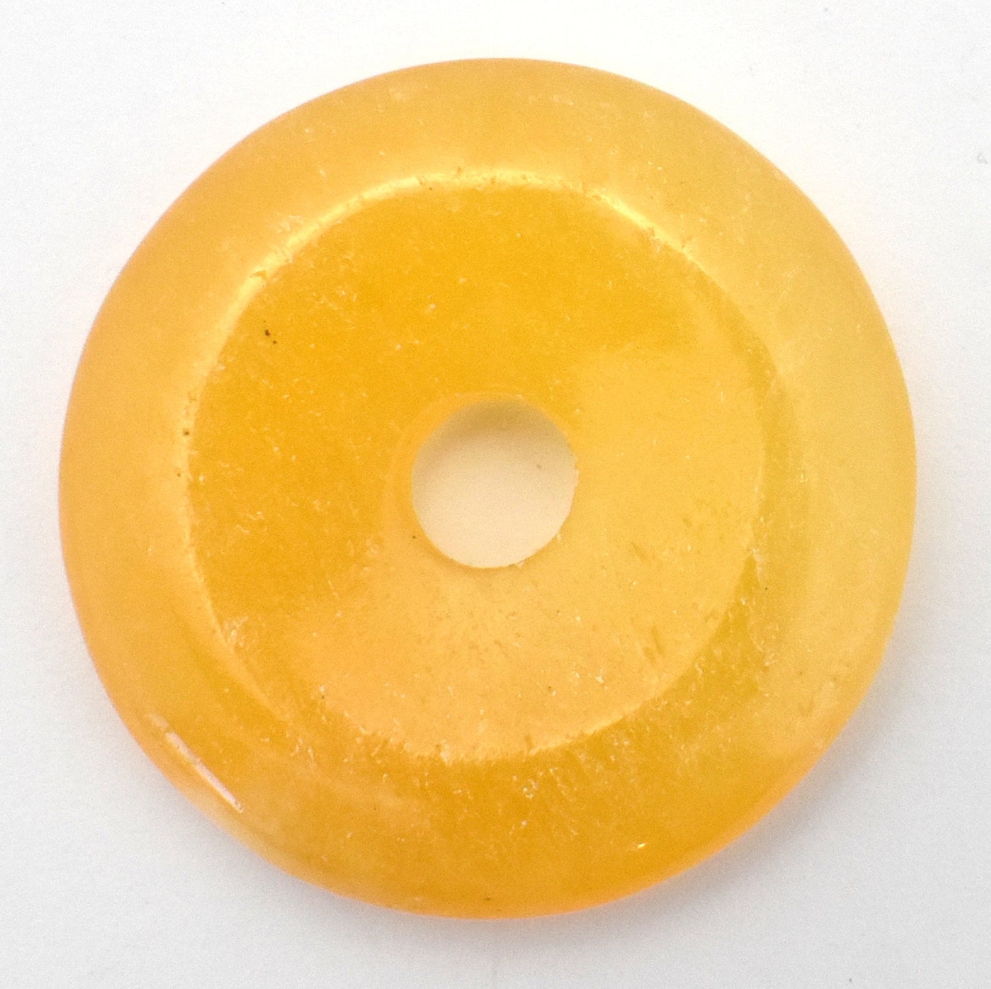 Orange Calcite Donut Pendant Carving