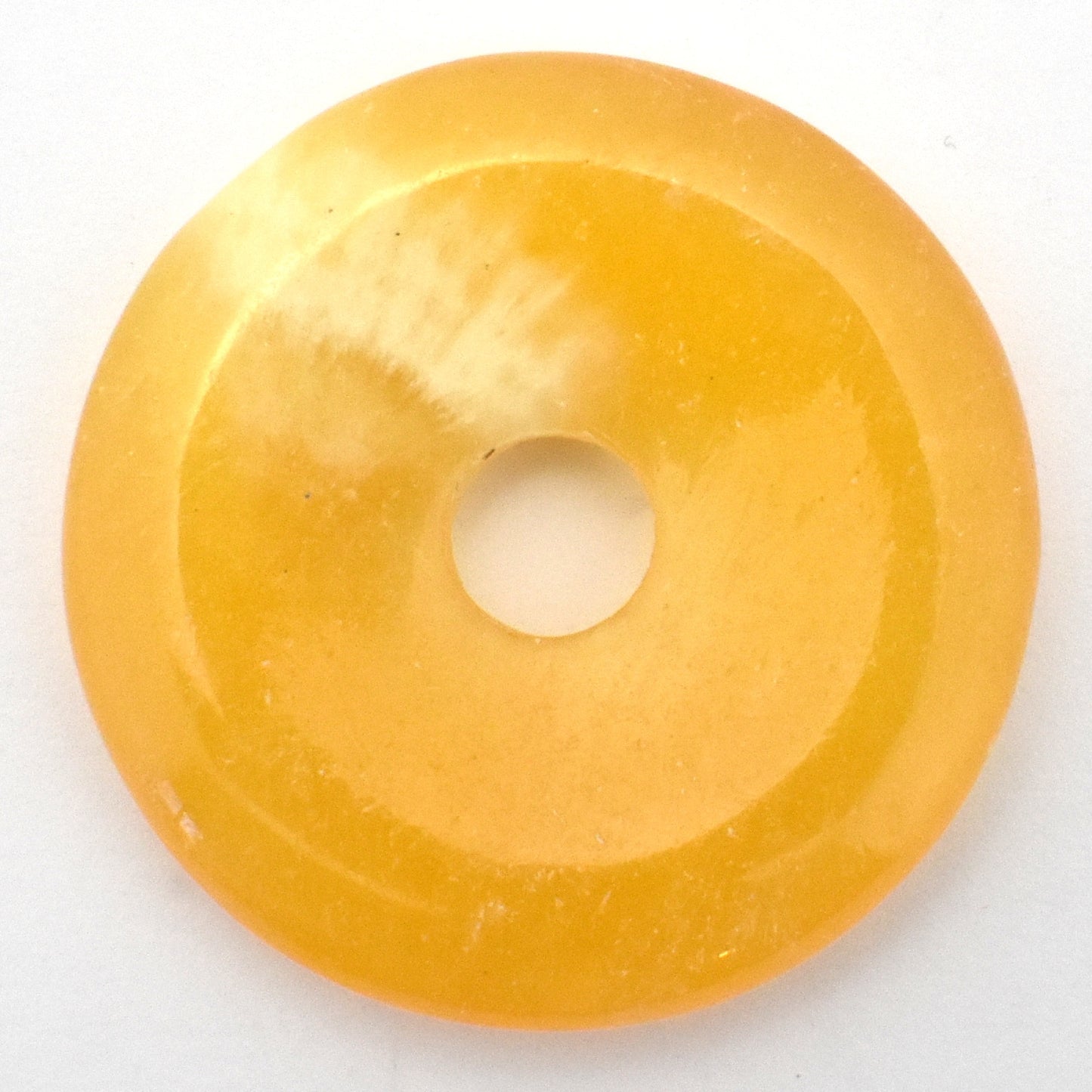Orange Calcite Donut Pendant Carving
