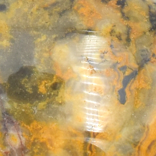 Yellow Crazy Lace Agate Soapstone Carving